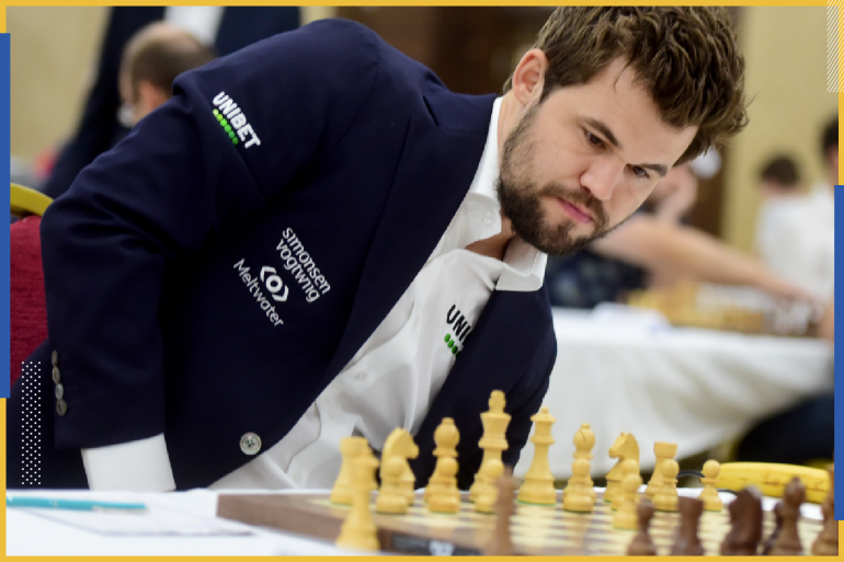 epa09607017 Defending Champion Magnus Carlsen of Norway plays against Ian Nepomniachtchi of Russia during the second round of FIDE World Chess Championship during the EXPO 2020 Dubai in Dubai, United Arab Emirates, 27 November 2021. EPA-EFE/ALI HAIDER