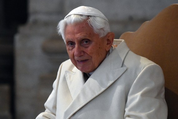 (FILES) In this file photo taken on December 08, 2015 Pope Emeritus Benedict XVI is pictured at St Peter's basilica in The Vatican before the opening of the "Holy Door" by Pope Francis to mark the start of the Jubilee Year of Mercy. - Former pope Benedict XVI failed to stop four clergymen accused of child sex abuse in the Catholic Church in Munich, the law firm that carried out a key probe said on January 20, 2022. The ex-pontiff -- who was the archbishop of Munich and Freising from 1977 to 1982 -- has "strictly" denied any responsibility, said lawyer Martin Pusch of Westpfahl Spilker Wastl which was tasked by the church to carry out the probe. (Photo by Vincenzo PINTO / AFP)