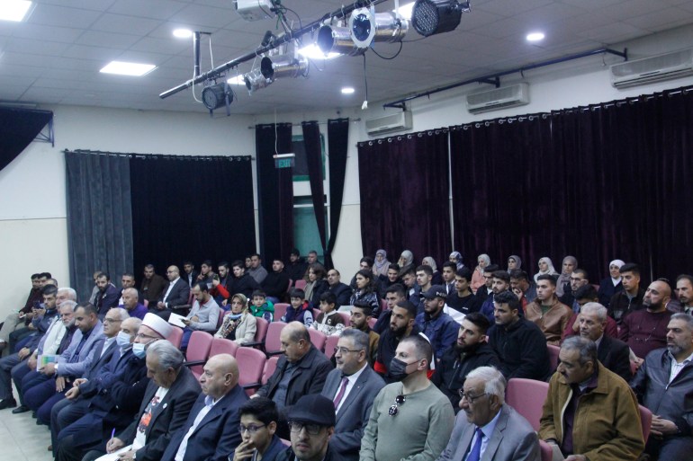 Part of the audience during the publication of his new book by the writer Bassam Al-Aghbar - West Bank - Nablus - Hamdi Mango - Al Jazeera Net1