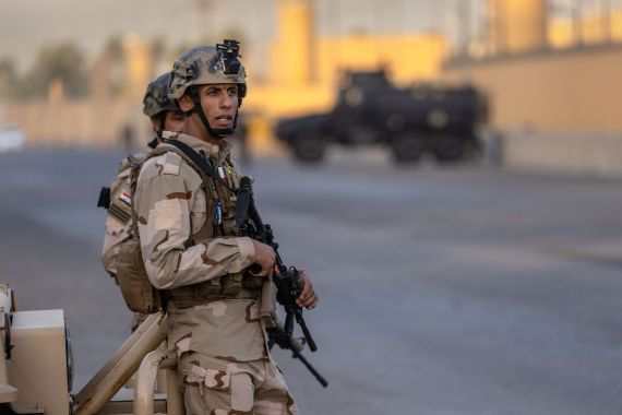 Coalition And Iraqi Forces Occupy Baghdad's International Zone