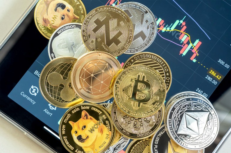 Here's how much money you'll get if you invest $ 1,000 in 4 of the best cryptocurrencies this year Cryptocurrency on Binance Trading Program, Thailand - July 1, 2021: Cryptocurrency on Binance Trading Program, Bitcoin BTC with altcoin digital currency cryptocurrency, BNB, Ethereum, Dogecoin, Cardano, defi p2p decentralized fintech market Source: Getty Images #: 1326770854