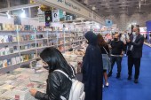 رواج كبير للكتب الأجنبية على حساب العربية بمعرض الدوحة للكتاب (الجزيرة)