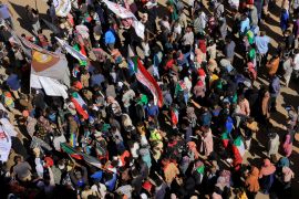 Protesters march during a rally against military rule following last month's coup in Khartoum