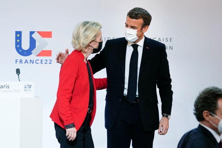 French President Emmanuel Macron speaks with European Commission President Ursula von der Leyen at the end of a media conference at the Elysee Palace in Paris