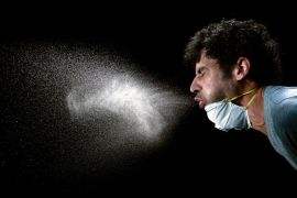 Human sneeze without a mask - stock photo عطسة عطاس عطس العطس كورونا أوميكرون