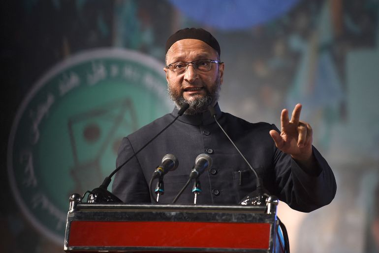 This picture taken on February 7, 2021 shows chief of All India Majlis-e-Ittehadul Muslimeen (AIMIM) party, Asaduddin Owaisi speaking during a public meeting in Ahmedabad. (Photo by SAM PANTHAKY / AFP)