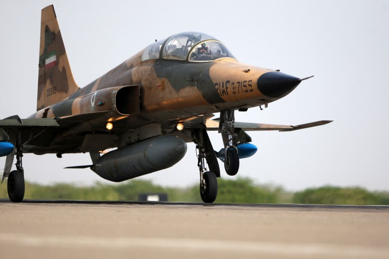An Iranian AirForce F-5F fighter plane takes off during manoeuvres in southern Iran