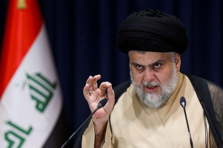Iraqi Shi'ite cleric Muqtada al-Sadr speaks after preliminary results of Iraq's parliamentary election were announced in Najaf, Iraq October 11, 2021. REUTERS/Alaa Al-Marjani