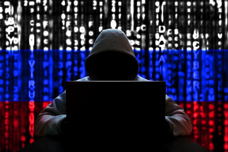 Cyber threat from Russia. Russian hacker at the computer, on a background of binary code, the colors of the flag of Russia. DDoS attack