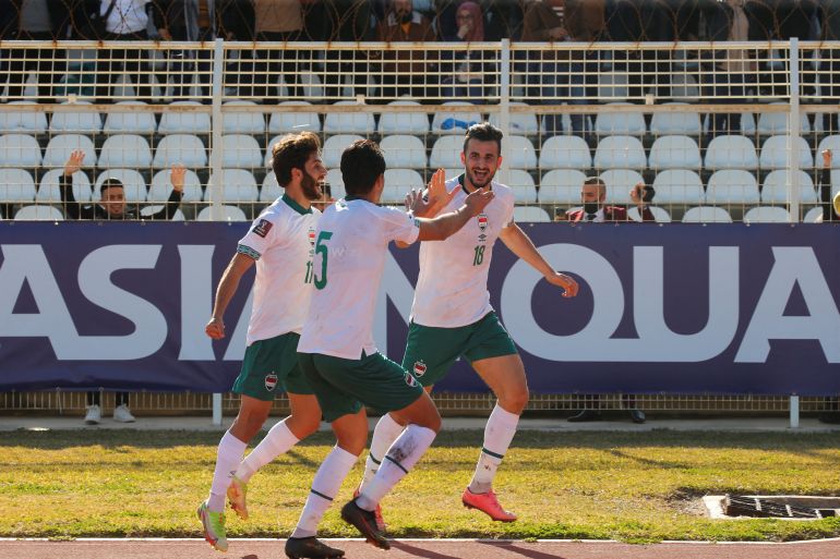 World Cup - Asian Qualifiers - Group A - Lebanon v Iraq Soccer Football - World Cup - Asian Qualifiers - Group A - Lebanon v Iraq - Saida Municipal Stadium, Sidon, Lebanon - February 1, 2022 Iraq's Ayman Hussein celebrates scoring their first goal with teammates REUTERS/Mohamed Azakir REFILE - CORRECTING CAPTION