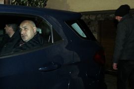 Bulgaria's former Prime Minister Borissov sits in a car in front of his house, in Sofia