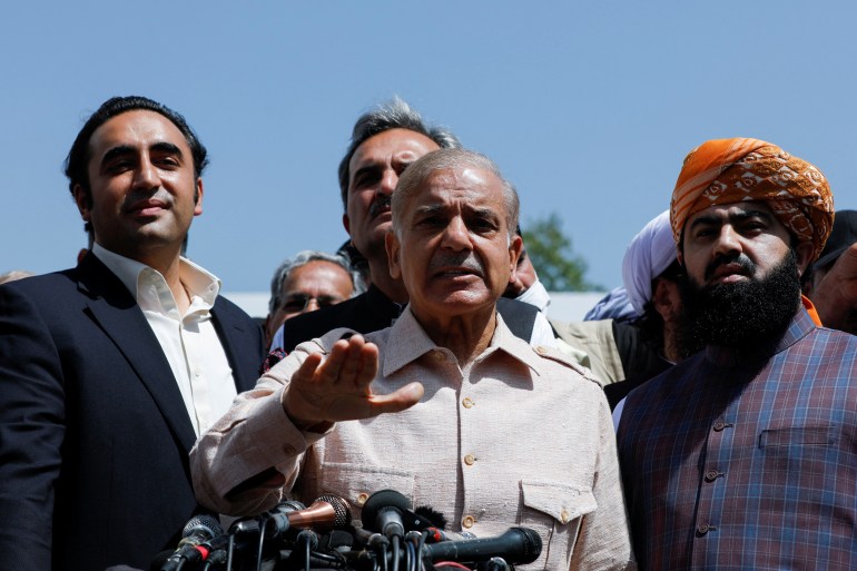 Leader of the opposition parties Mian Muhammad Shahbaz Sharif, addresses a news conference outside the parliament building, in Islamabad