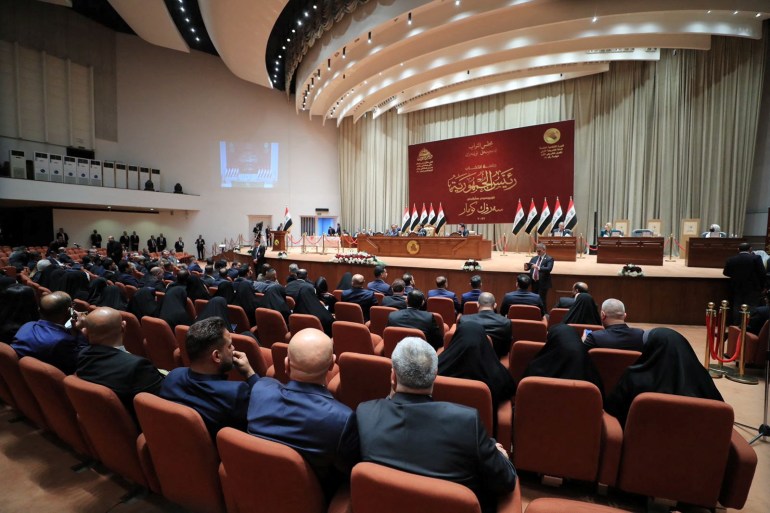 Iraqi lawmakers attend a session of the Iraqi parliament, in Baghdad