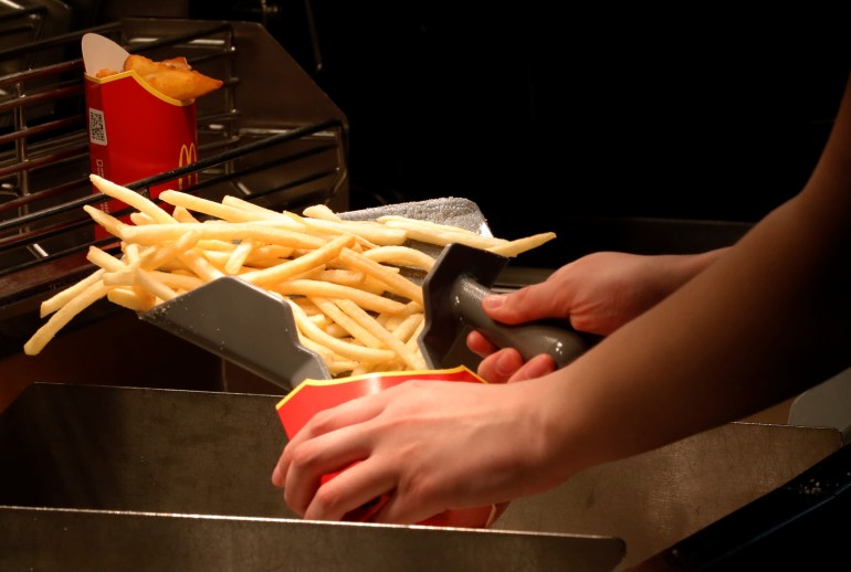 An employee cooks French fries at a McDonald's restaurant in Moscow An employee cooks French fries at a McDonald's restaurant in Moscow, Russia April 24, 2018. Picture taken April 24, 2018. REUTERS/Tatyana Makeyeva