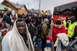 Refugees from many countries including in Africa, the Middle East and India - mostly students of Ukrainian universities - are seen at the Medyka pedestrian border crossing in eastern Poland on February 27, 2022 [File: Wojtek Radawnski / AFP]
