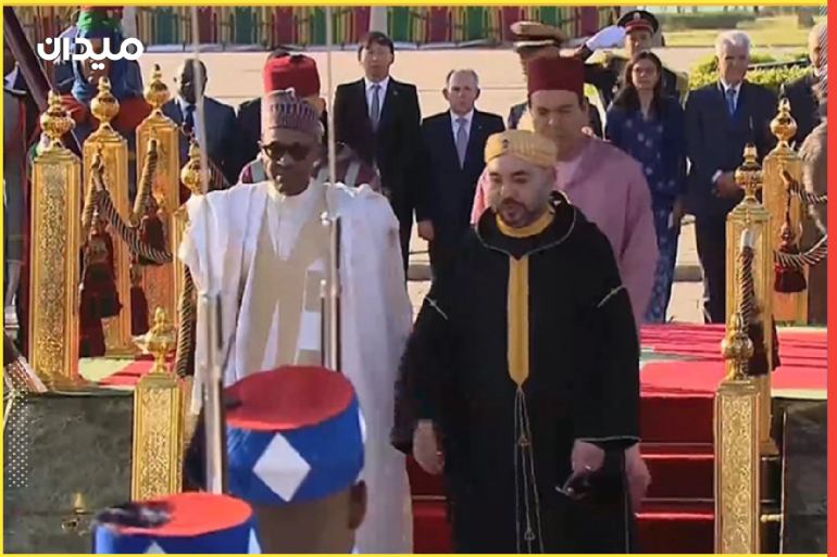 ملك المغرب محمد السادس (يمين) ونظيره محمد بخاري.