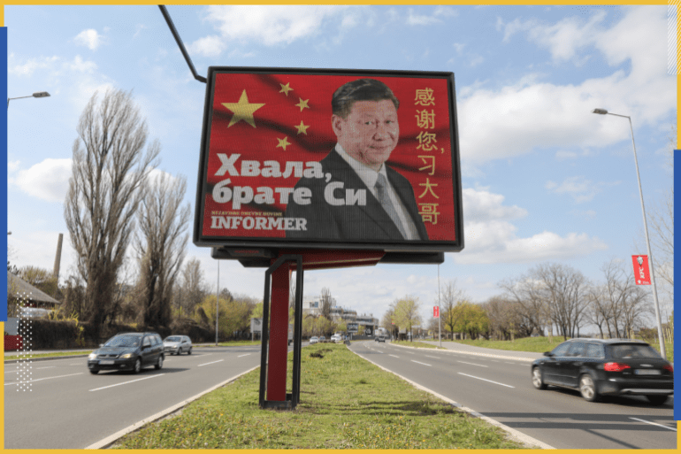 Cars drive by a billboard depicting Chinese President Xi Jinping as the spread of the coronavirus disease (COVID-19) continues in Belgrade, Serbia, April 1, 2020. The text on the billboard reads "Thanks, brother Xi". Picture taken April 1, 2020. REUTERS/Djordje Kojadinovic