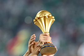 Algeria wins 2019 Africa Cup of Nations Algeria wins 2019 Africa Cup of Nations- - CAIRO, EGYPT - JULY 19: Algerian team celebrate championship with trophy after the 2019 Africa Cup of Nations final match between Senegal and Algeria at the Cairo Stadium in Cairo, Egypt on July 19, 2019. Algeria won their first Africa Cup of Nations (AFCON) title in 29 years, beating Senegal 1-0 late Friday in Egypt.