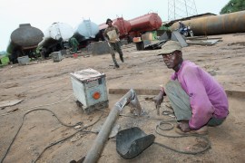 Nigerian Workers Construct Petrol Tankers