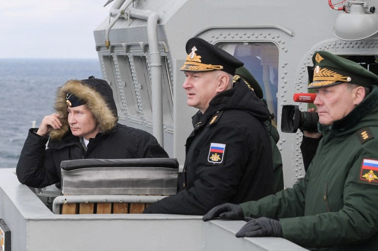 Russian President Vladimir Putin attends the joint drills of the Northern and Black sea fleets on board the Russian guided missile cruiser Marshal Ustinov in the Black Sea