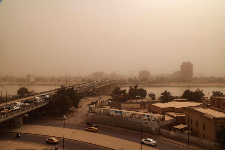 A general view of the dust covered sky during a sandstorm in Baghdad