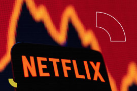 Smartphone with Netflix logo is seen in front of a stock graph in this illustration taken April 19, 2022. REUTERS/Dado Ruvic/Illustration