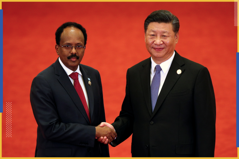 Somalia's President Mohamed Abdullahi Mohamed, left, shakes hands with Chinese President Xi Jinping during the Forum on China-Africa Cooperation held at the Great Hall of the People in Beijing, September 3, 2018. Andy Wong/POOL Via REUTERS