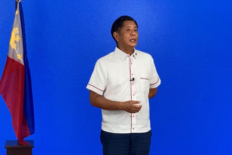In this photo taken May 9, 2022, Presidential candidate Ferdinand Marcos Jr., son of the late dictator Ferdinand Marcos Sr., speaks to the members of the media, at his party heaquarters in Manila. (Photo by MIKHAEL FLORES / AFP)