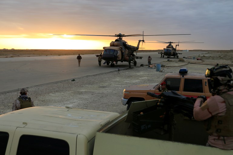 Iraqi Air Force helicopters land at Ain al-Asad airbase in the Anbar province, Iraq December 29, 2019. REUTERS/Thaier Al-Sudani