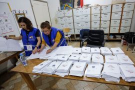 Lebanese electoral staff start counting votes for parliamentary elections at a polling station in the northern coastal city of Batroun, on May 15, 2022. (Photo by Ibrahim Chalhoub / AFP)