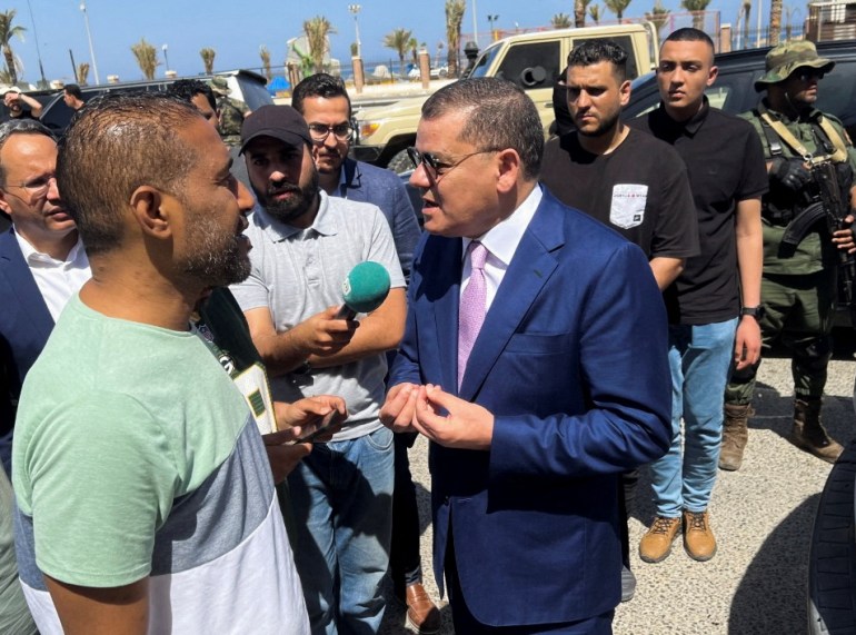 The head of Libya's Government of National Unity, Abdulhamid al-Dbeibah, visits the sites of the clashes in Tripoli