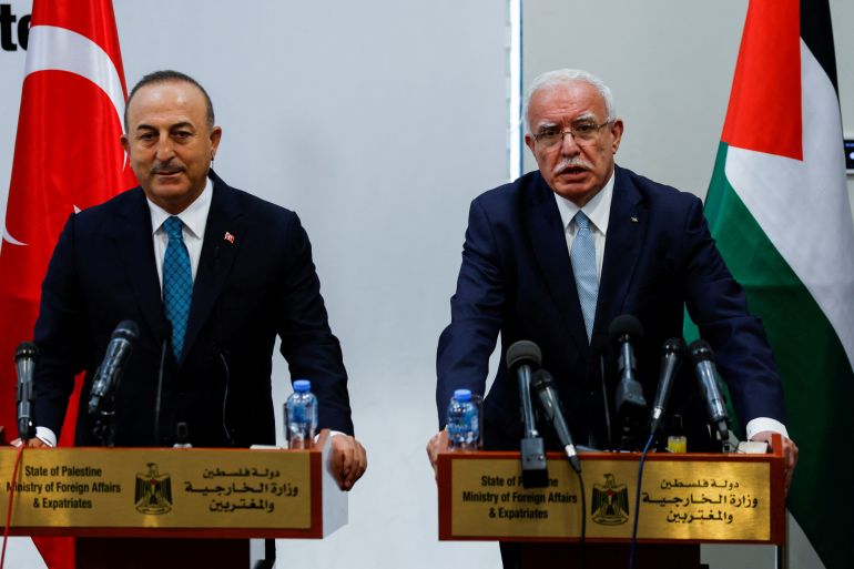 Palestinian Foreign Minister al-Maliki and Turkish Foreign Minister Cavusoglu hold a news conference in Ramallah