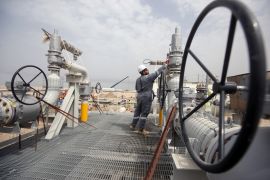 A worker is seen at Iraq's Majnoon oilfield near Basra