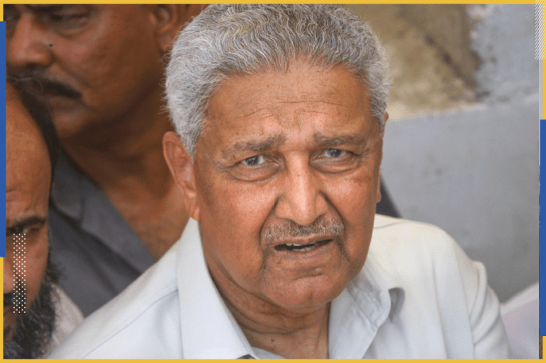 Pakistani nuclear scientist Abdul Qadeer Khan is photographed after a silent prayer over the grave of his brother Abdul Rauf Khan, during funeral services in Karachi May 8, 2011. Khan, lionised by many in Pakistan for being founder of Pakistani nuclear programme, admitted in a televised address of selling nuclear secrets to Iran, Libya and North Korea but government pardoned him. REUTERS/Athar Hussain (PAKISTAN - Tags: POLITICS OBITUARY RELIGION)
