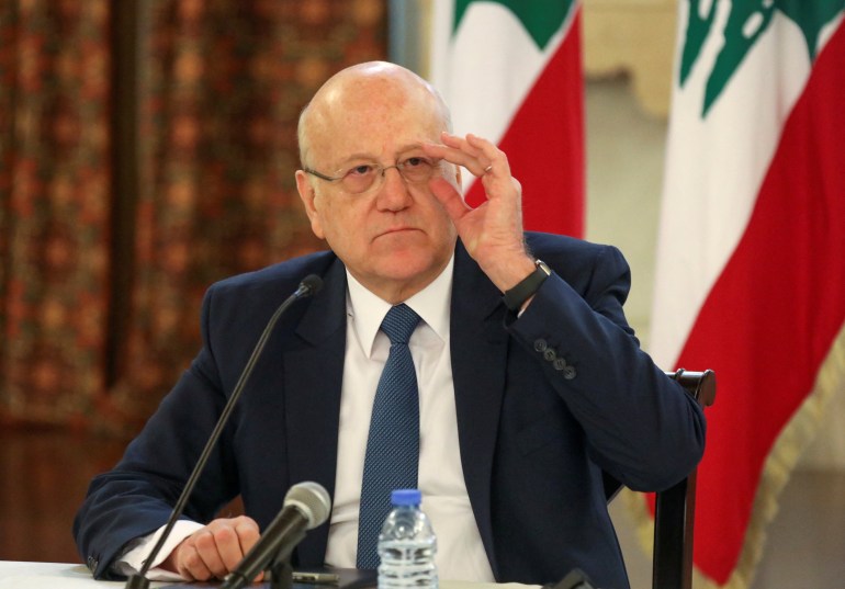 Lebanese Prime Minister Najib Mikati attends a news conference on the latest developments in the country, at the governmental palace in Beirut