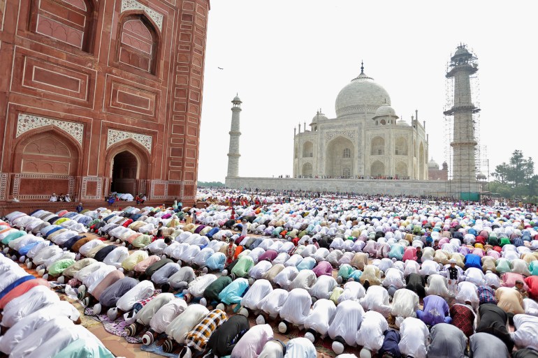 Muslims attend Eid al-Fitr prayers to mark the end of the holy fasting month of Ramadan, at the Taj Mahal mosque in Agra, India, July 7, 2016. REUTERS/Pawan Kumar