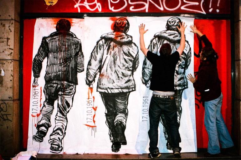 17 October 2011: Mural artists honour the Algerians who were killed during the massacre in 1961. (Photograph by Franck Prevel/ Getty Images)