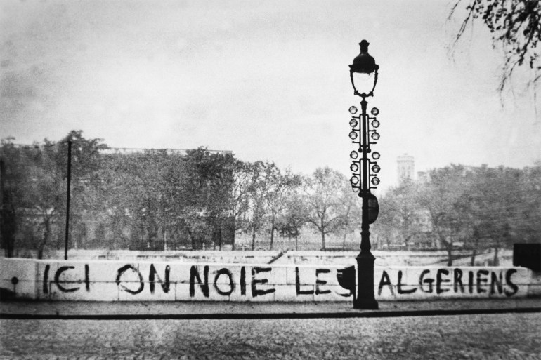 17 October 1961: Graffiti on the Pont Saint-Michel translates as ‘Algerians are drowned here’. Dozens of bodies were later pulled from the River Seine. (Photograph by Getty Images)