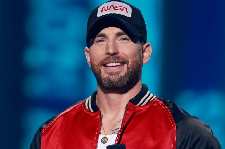 US actor Chris Evans speaks on stage during the MTV Movie and TV Awards at the Barker Hangar in Santa Monica, California, June 5, 2022. (Photo by Michael TRAN / AFP)