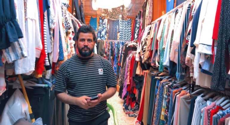 المياحي حالة السوق ومنها تجارة الملابس منذ بداية العام الجاري في سبات تام (الجزيرة نت)