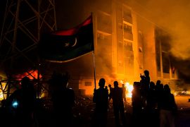 Protesters set fire to the Libyan parliament building after protests against the failure of the government in Tobruk