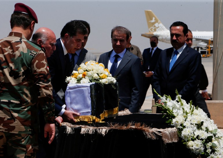 Funeral ceremony of Iraqis who were killed in an attack on a mountain resort, in Erbil