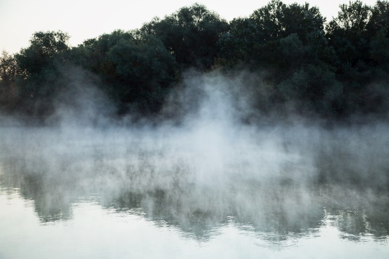 morning evaporation of water over the river, fog over the water; Shutterstock ID 1821419810; purchase_order: ajnet; job: ; client: ; other: