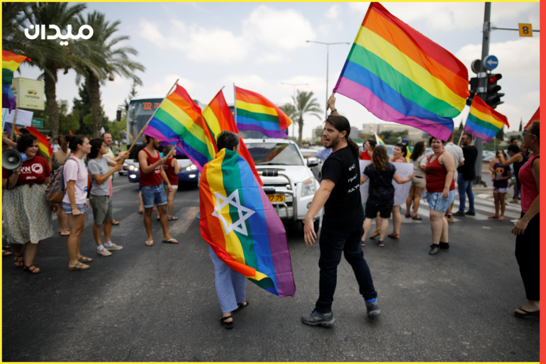 Protestors block a road during a LGBT community members protest against discriminatory surrogate bill in Beersheba, Israel July 22, 2018. REUTERS/Amir Cohen