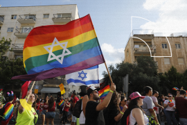 epaselect epa06923763 People march during the annual Gay Pride parade in Jerusalem, Israel, 02 August 2018. Under tight police security thousands of people marched at the Jerusalem parade with a main theme this year supporting the gay couples and transgenders call on the government to recognize their rights to parenthood equality such as marriage, adoption and surrogacy. EPA-EFE/ABIR SULTAN