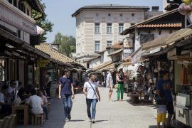People are seen walking on the streets of Sarajevo, Bosnia and Herzegovina, on July 2, 2021. DENIS ZUBERI/ANADOLU AGENCY VIA GETTY IMAGES