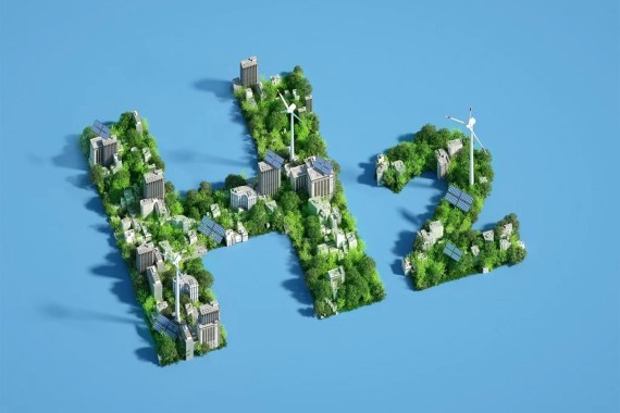 H2 hydrogen icon made out of green sustainable city. - stock photo Digital generated image of H2 hydrogen icon made out of green sustainable city with wind turbines and solar panels on blue background. getty1355028471