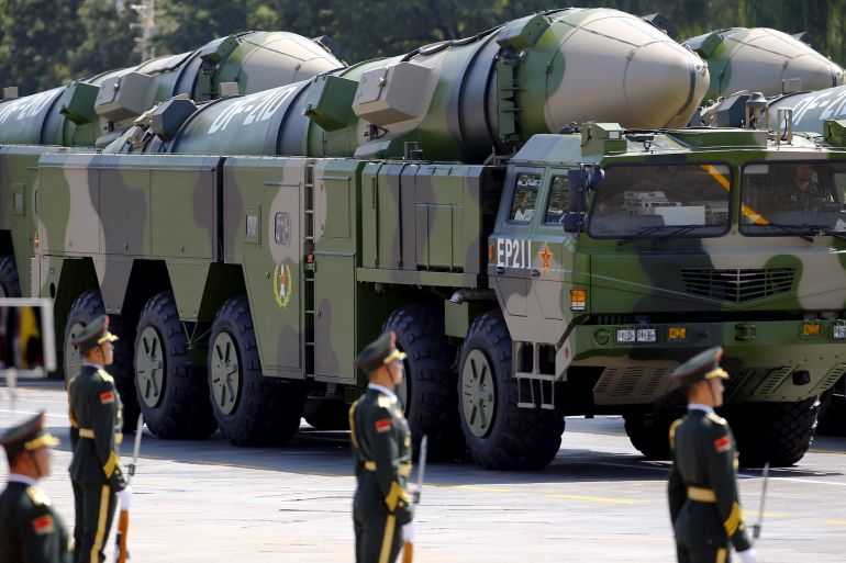 Military vehicles carrying DF-21D ballistic missiles roll to Tiananmen Square during a military parade to mark the 70th anniversary of the end of World War Two, in Beijing, China, September 3, 2015. REUTERS/Damir Sagolj