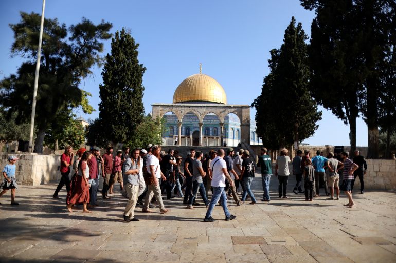 Jews visit the compound known to Muslims as Noble Sanctuary and to Jews as Temple Mount in Jerusalem's Old City as Israel marks Tisha B'Av, the ninth day in the Hebrew month of Av, the destruction of the First and Second Temples, August 7, 2022. REUTERS/Ammar Awad