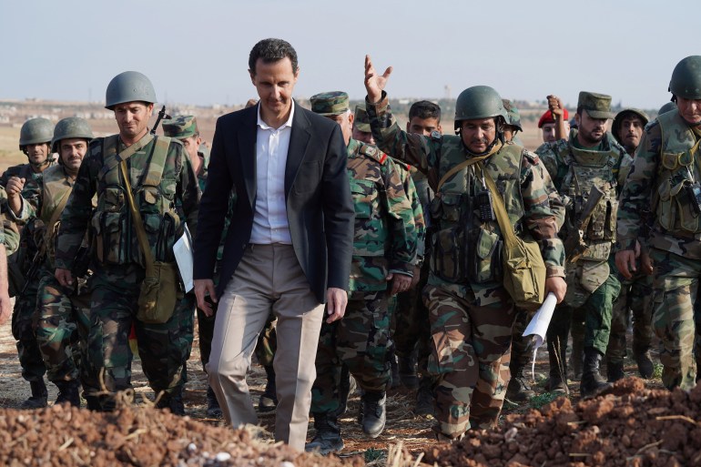 Syrian President Bashar al Assad visits Syrian army troops in war-torn northwestern Idlib province